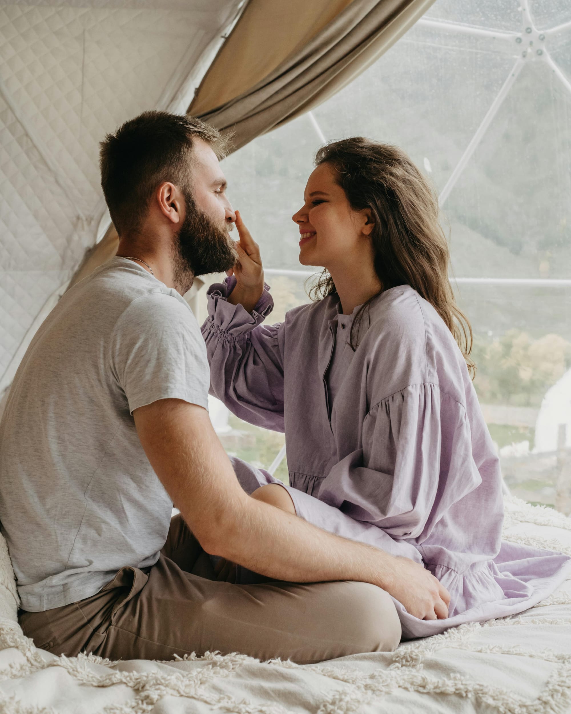 Couple sharing a happy, intimate moment together.